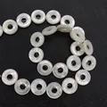 Macro view of natural white mother of pearl ring beads with iridescent luster for DIY jewelry - Small Style (8mm)