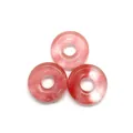 Three semi-transparent pink natural rose quartz donut pendants for DIY jewelry - Watermelon Quartz