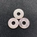 Three pieces of pink quartz donut pendants showing natural stone texture and ice cracks - Rose Quartz