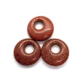 Three round Goldstone donut charms with glittering gold specks for DIY jewelry making - Gold Sandstone
