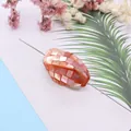 Macro view of oval mosaic bead with shell inlays for DIY jewelry and necklace making - 14x28mm / No.3 (Iridescent Pink Purple)