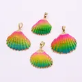 Detailed view of four colorful gradient natural shell pendants with golden metal edges - Rainbow Gradient (No. 4)