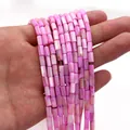 Dettaglio macro di perle a tubo in conchiglia rosa vivace per creazione gioielli DIY - Stile Cilindrico (1006-B220827015) / 4x8mm (11g) / N. 8 (Rosa Acceso)