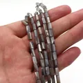 Macro shot of grey cylindrical mother of pearl shell beads with natural iridescent luster - Cylinder Style (1006-B220827015) / 4x8mm (11g) / No. 3 (Grey Black)