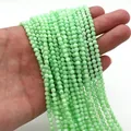 Dettaglio di perle tonde in conchiglia verde chiaro per creazione di gioielli - Verde Chiaro (N.11)