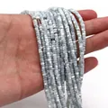 Detalle de cuentas de concha cuadradas en hilos para la creación de joyas DIY - Blanco Roto