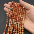 Perline di agata naturale sfaccettata nei toni rosso e arancio per gioielli DIY - Agata Venata di Drago