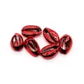 Close-up of six metallic red electroplated cowrie shell beads for DIY jewelry - Red