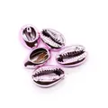 Close-up of five bright pink electroplated natural cowrie shells for DIY jewelry making - Pink