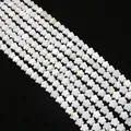 Macro detail of white flower-shaped mother of pearl shell beads for jewelry making - Five-Petal Flower / 6mm