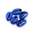 Macro view of five electroplated royal blue conch shell pendants for DIY jewelry making - Sapphire Blue