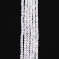 Macro shot of white mother of pearl round beads with natural iridescent luster for DIY jewelry - 3x4mm / White Shell