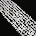 Vue macro de perles en forme d'étoile en nacre blanche naturelle pour création de bijoux - 6mm / Blanc