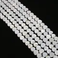 White heart-shaped natural mother of pearl shell beads with iridescent luster for DIY jewelry - Vertical Hole Heart Shape