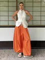 Women's orange cotton wide-leg lantern pants paired with a white halter top - S / Orange Red