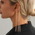 Elegant gold tassel ear cuff jewelry featuring long multi-layer hanging chains on model - Multi-layer Round Bead Tassel Ear Cuff (0048) / Single Piece / Gold