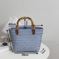 Light blue woven straw tote bag with brown bamboo handles and chic chevron pattern - Large / Blue (Bamboo Handle)