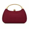 Detail of red woven evening clutch bag with elegant golden curved metal handles - Burgundy