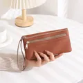 Braune lange Geldbörse mit Lederstruktur, Doppelreißverschluss und praktischer Handschlaufe - Long Litchi Texture / Braun