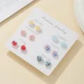 Set of 7 colorful resin rose earrings on a weekly card for diverse daily outfits - Multi-color 3D Rose Set (E2067-1)