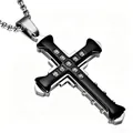 Macro shot of silver-framed black cross necklace with crystals and ball chain - Black Knight