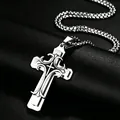 Detailed macro of layered stainless steel cross pendant with filigree on black leather - Black Enamel Style