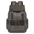 Mochila vintage de lona gris con solapa de cuero marrón y múltiples bolsillos útiles - Gris