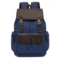 Retro canvas backpack in dark blue with brown leather flaps and drawstring closure - Blue