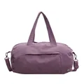 Large purple waterproof nylon travel bag with adjustable shoulder strap and hand grip - Light Purple