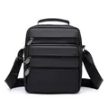 Classic black leather messenger bag with multiple zippers and adjustable shoulder strap - Black