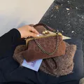 Sac vintage imprimé léopard avec fermoir doré et bandoulière en cuir - Marron