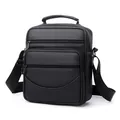 Borsa a tracolla da uomo in pelle nera con trama a grana e tasche multiple con zip - Nero