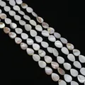 Fili di perle in madreperla naturale bianca in forma di goccia iridescente - goccia