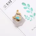 Detail of raw white crystal pendant with turquoise inlay and gold-plated edges - White Crystal and Blue Turquoise