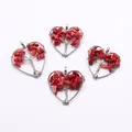 Detail of four silver tree of life heart pendants with vibrant red gravel stones - Sea Pearl Coral