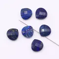 Macro detail of faceted heart-shaped lapis lazuli beads with natural pyrite spots and drill holes - 1.5cmx1.5cm / Lapis Lazuli