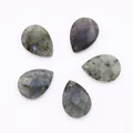 Macro view of five faceted labradorite teardrop pendants with natural blue flash and top holes - Flash Stone (Labradorite)