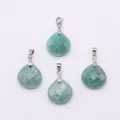 Detail of four faceted teardrop natural stone pendants with silver metal bails - Amazonite
