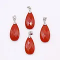 Macro shot of faceted teardrop-shaped red jasper pendants with silver metal clasps - 13x25mm / Rainbow Stone