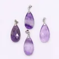 Detail of four teardrop-shaped faceted purple amethyst pendants with silver metal clasps - 13x25mm / Amethyst