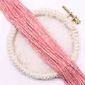 Close-up of pink square natural stone beads for DIY jewelry making and necklaces - Matte Pink