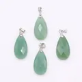 Macro detail of faceted green teardrop natural stone pendants with silver metal clasps - 13x25mm / Green Aventurine
