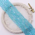 Macro-opname van ovale lichtblauwe kattenoog kralen voor DIY sieraden maken - Hemelsblauw