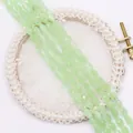 Detailed view of faceted oval light green stone beads for DIY jewelry making - Light Green