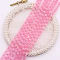 Macro detail of faceted pink teardrop cat eye stone beads for DIY jewelry making - 4x6MM / US 1