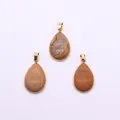 Three teardrop-shaped natural picture jasper pendants with gold-plated metal edges - Jasper