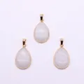 Three teardrop-shaped milky white opal stone pendants with elegant gold plating finish - White Jade