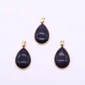 Three teardrop blue sandstone pendants with gold-plated edges and sparkling mineral crystals - Blue Sandstone