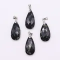 Faceted teardrop pendant in green spotted natural stone with silver metal clasp - 13x25mm / Rhyolite