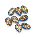 Macro shot of 8 hand-painted colorful cowrie shells with sunburst patterns for DIY jewelry - Number 2 / 20 Pieces Set